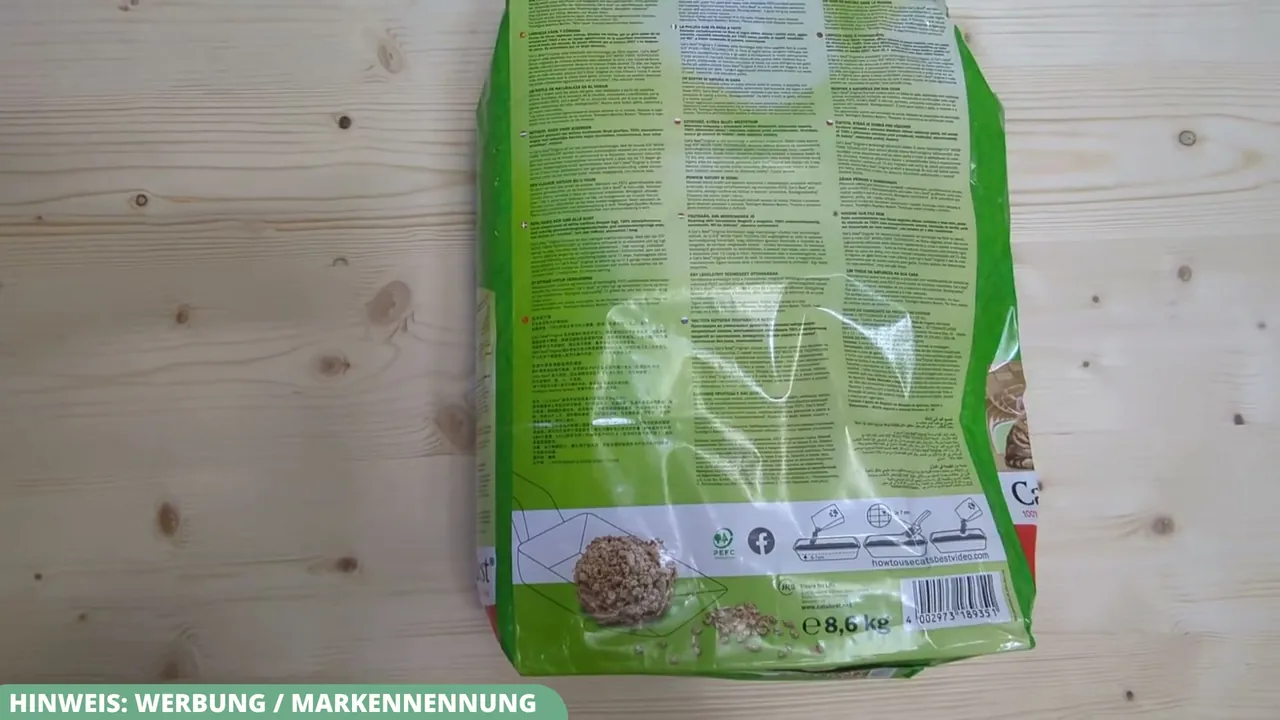 Auf der Rückseite der Packung sind Hinweise zur sparsamen Dosierung und zur Entsorgung einzelner Klumpen dargestellt.
